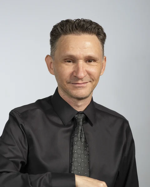 Professional headshot of David Courtney